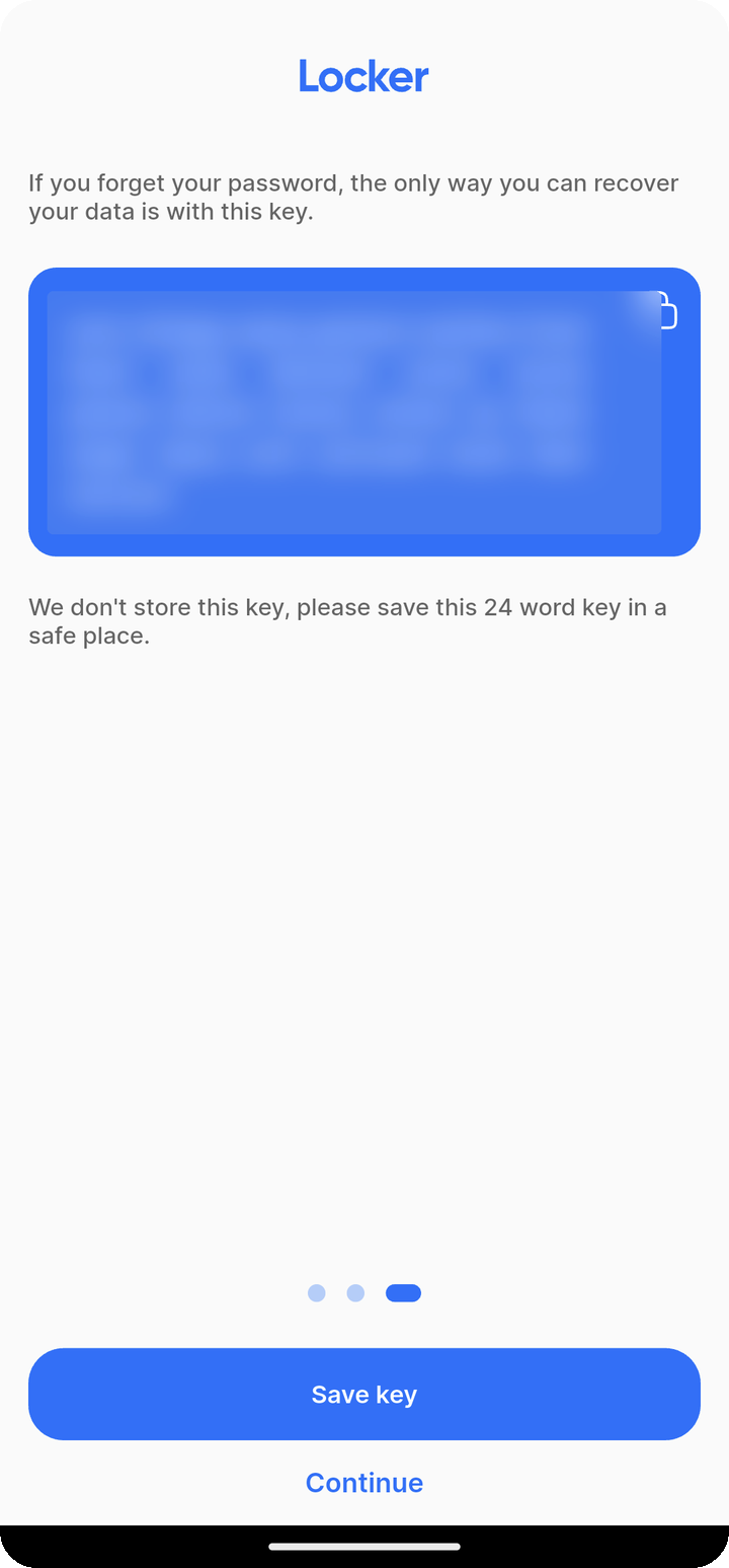 Recovery key save screen on Ente Locker mobile with key frosted