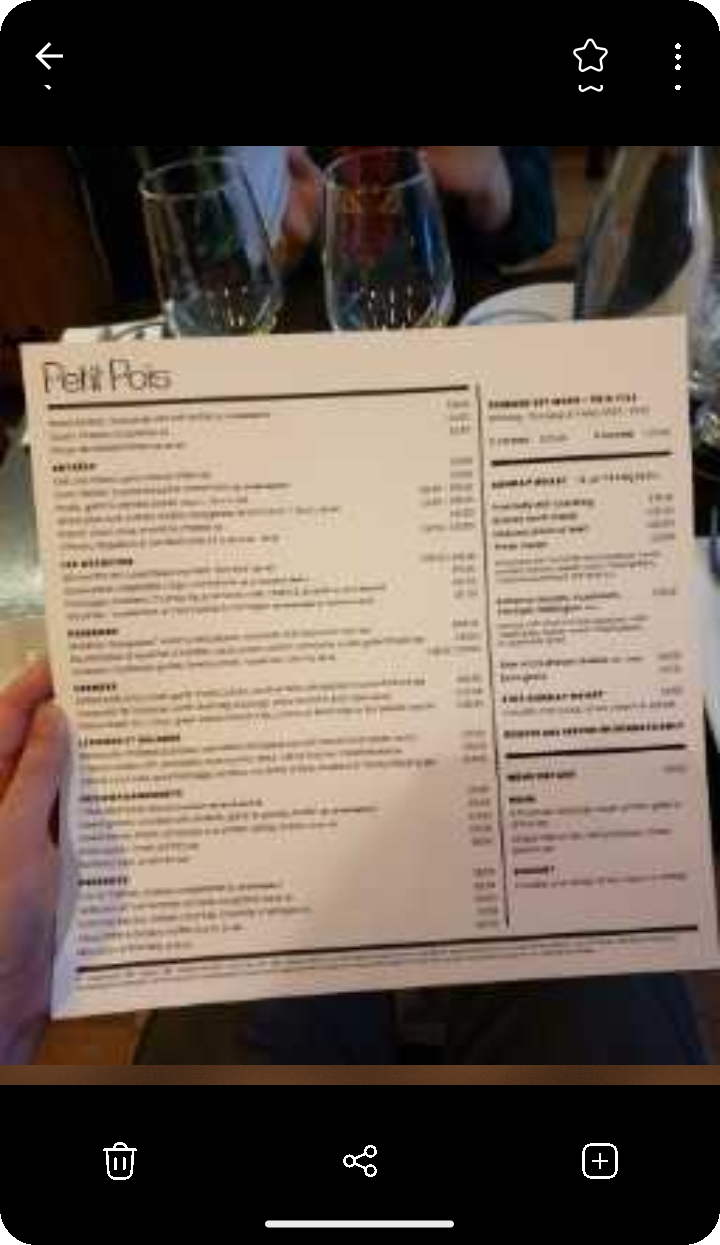 Cafe menu photo open in the Ente Photos mobile viewer