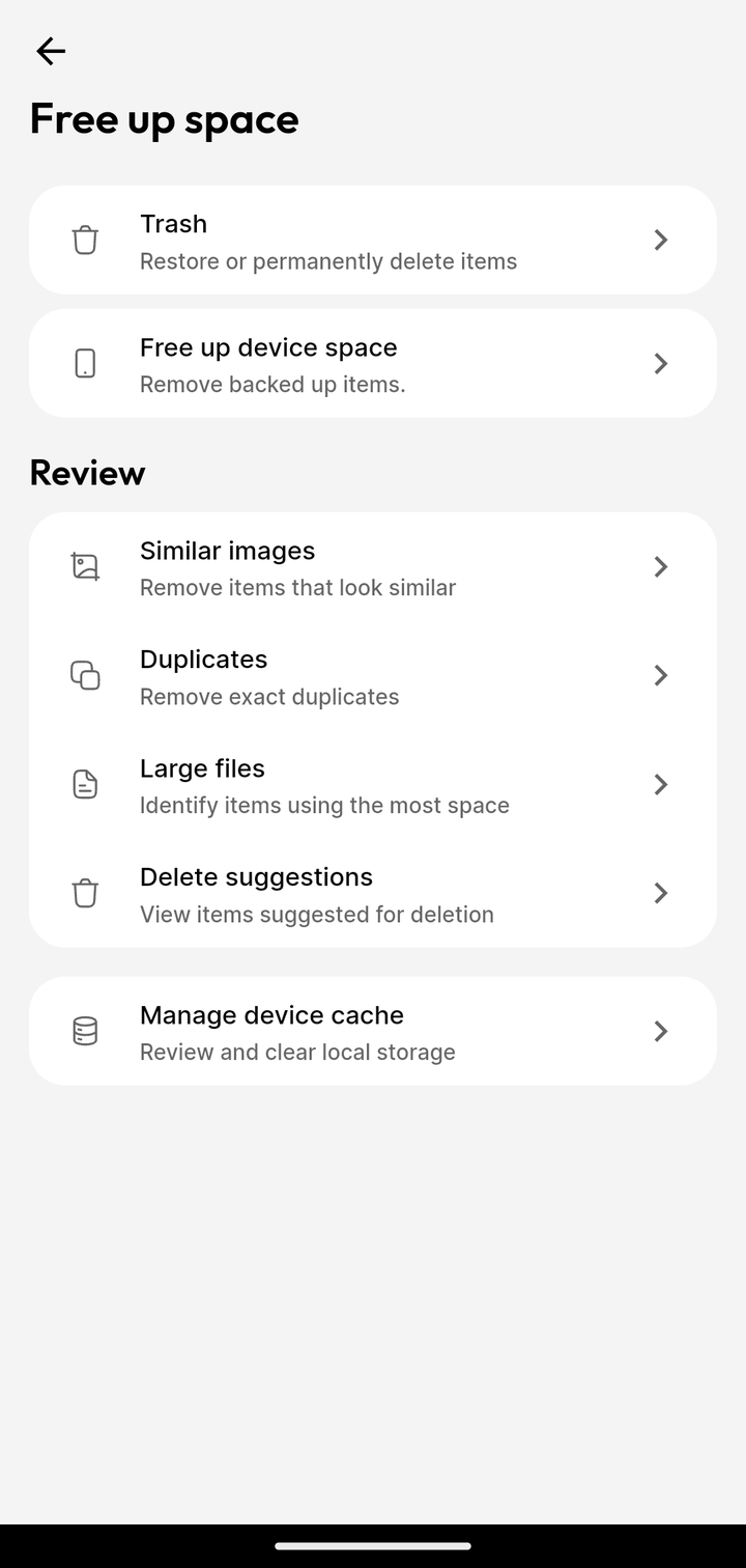 Free up space menu on Ente Photos mobile with Trash Free up device space and Review options